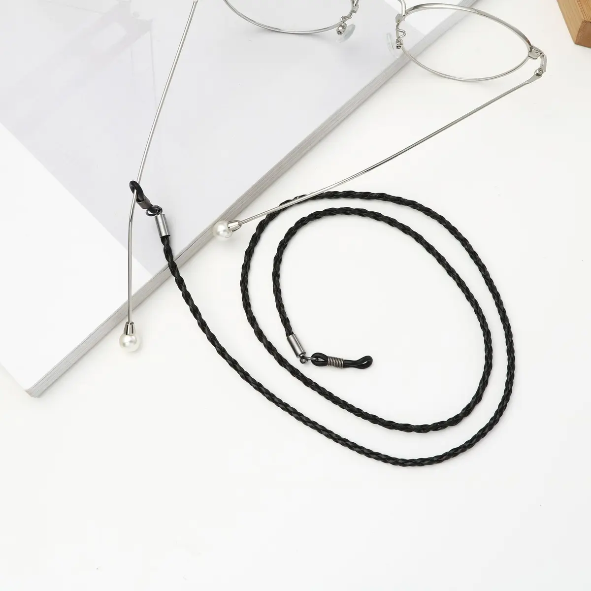 Gold-colored eyeglasses chain