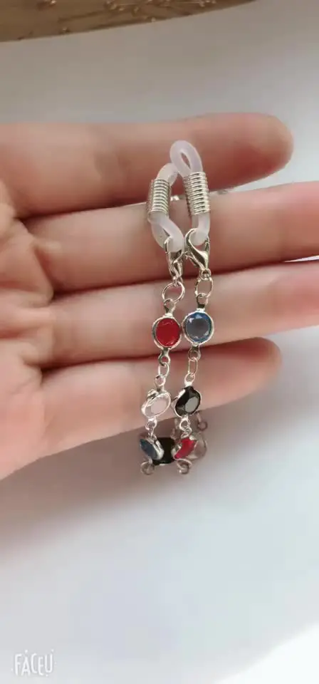 Gold-colored eyeglasses chain